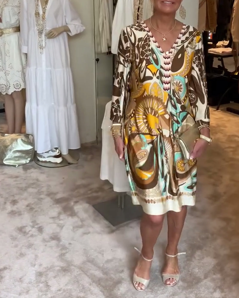 Comfortable & stylish women's boho tunic dress with vibrant sunburst print.