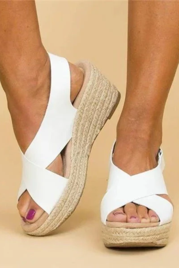 Brown women's supportive espadrille wedge sandals with adjustable straps, ideal for summer travel & comfort.