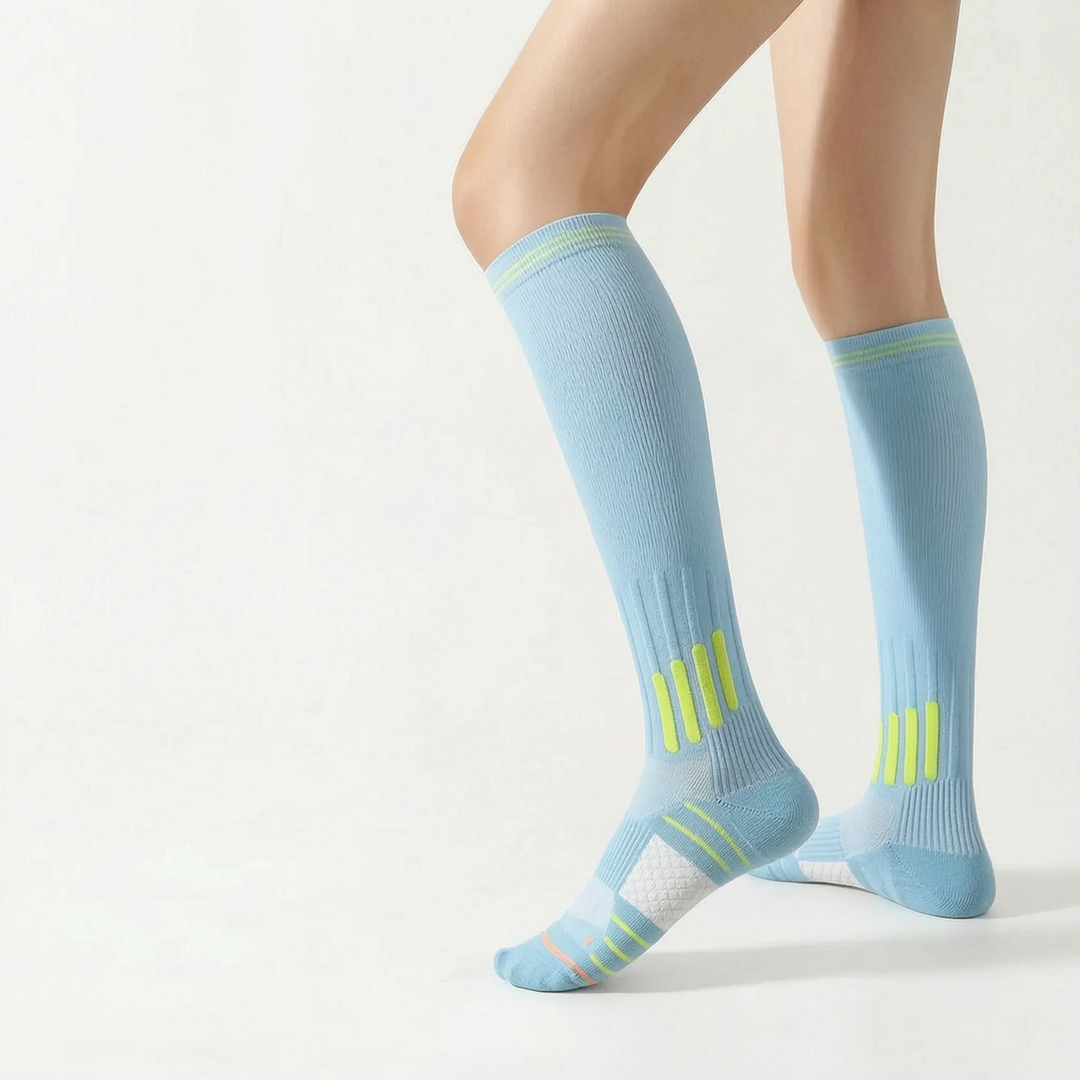 Women's activewear knee-high sports socks designed for optimal support & training.