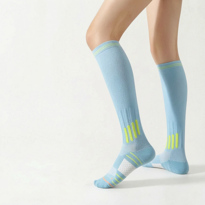 Women's activewear knee-high sports socks designed for optimal support & training.