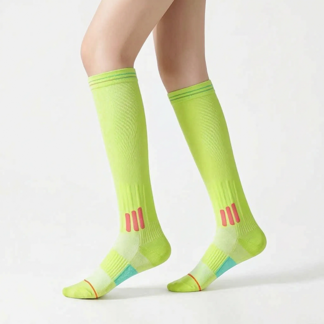 Athletic knee-high support socks for women, perfect for active performance & training.
