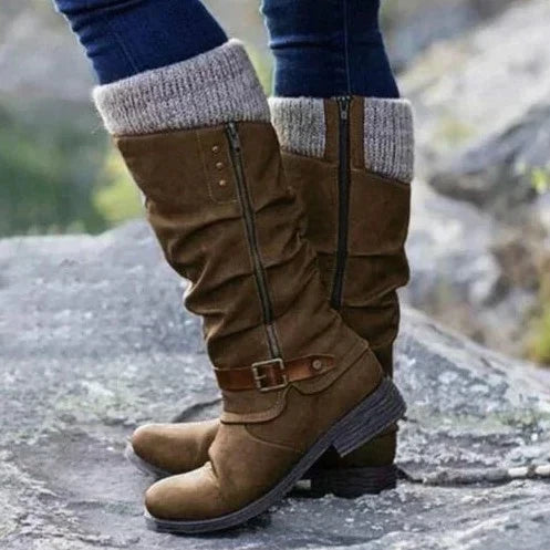 Durable women's knee-high comfort boots for active wear, providing excellent foot support and cold weather protection.