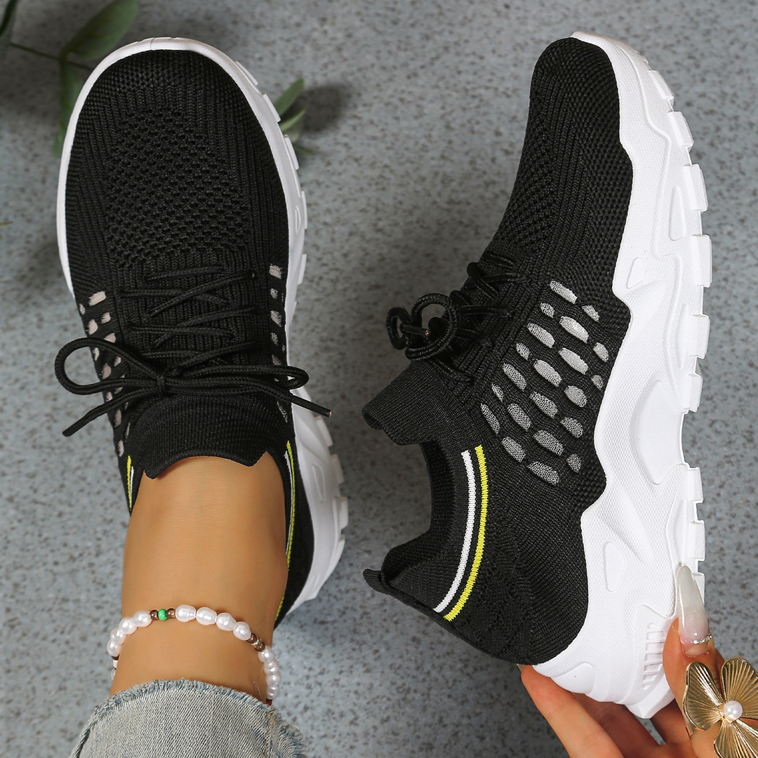 Lace-up women's orthopedic sneakers, designed for comfortable walking with superior arch support.