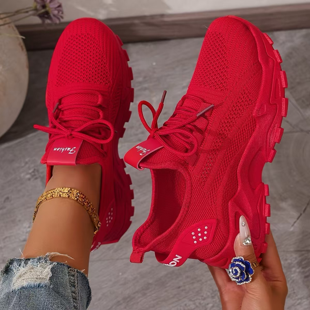 Athletic women's lace-up orthopedic sneakers, perfect for everyday walking with arch support.