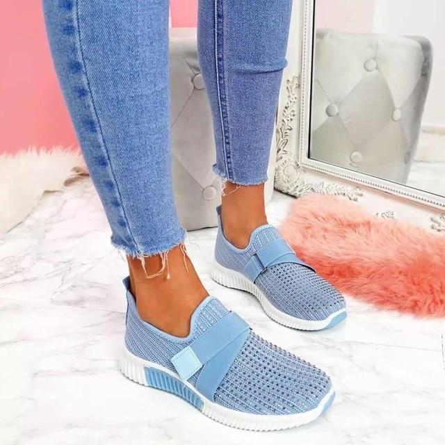 Women's slip-on sneakers with cushioned sole and supportive design, perfect for long walks.