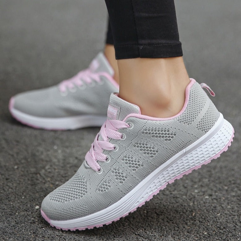 Women's comfort walking shoes with integrated posture correction technology & arch support.