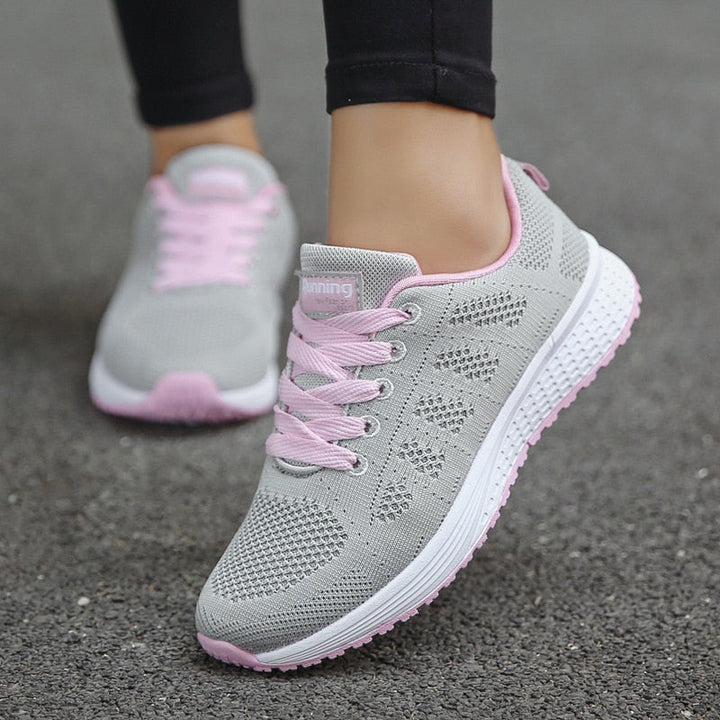 Women's sneakers for walking, promoting better posture & providing pain relief with arch support.