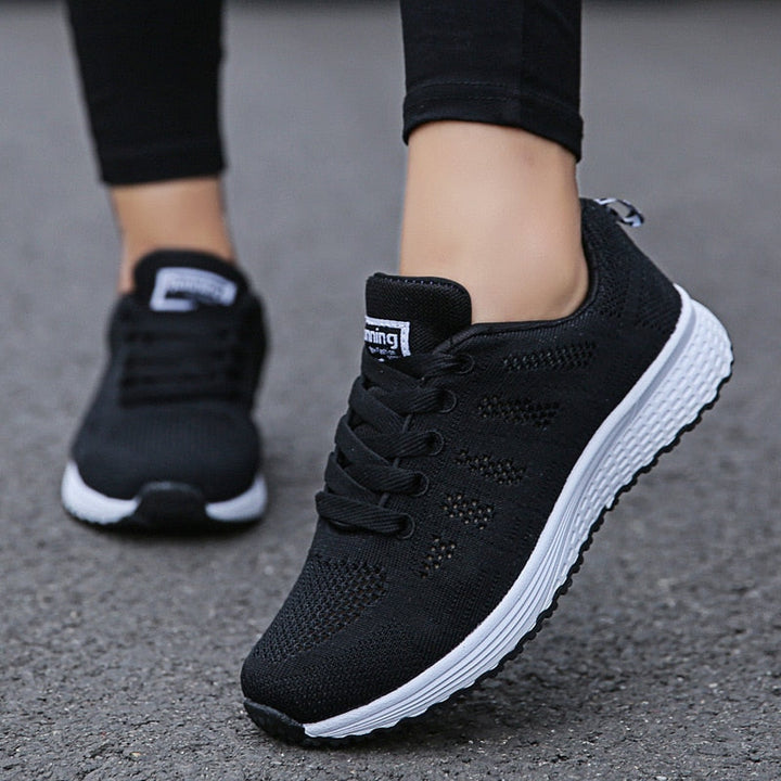 Stylish women's supportive sneakers with advanced arch support, ideal for long walks.