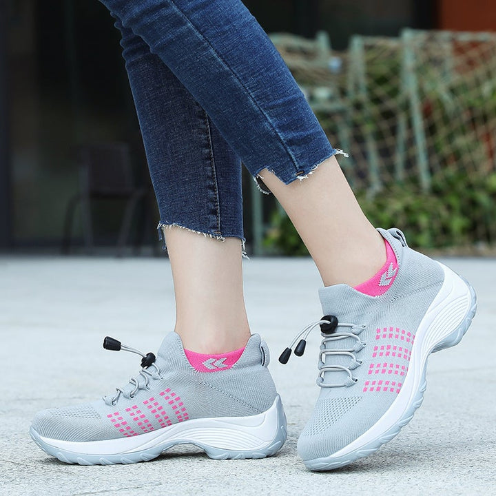 Women's supportive sneakers with premium cushioning for long-lasting walking comfort.