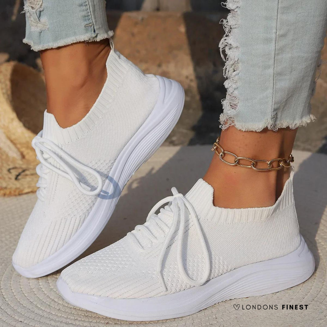 Women's supportive walking sneakers with arch support and cushioning for everyday comfort. Ideal for active lifestyles.
