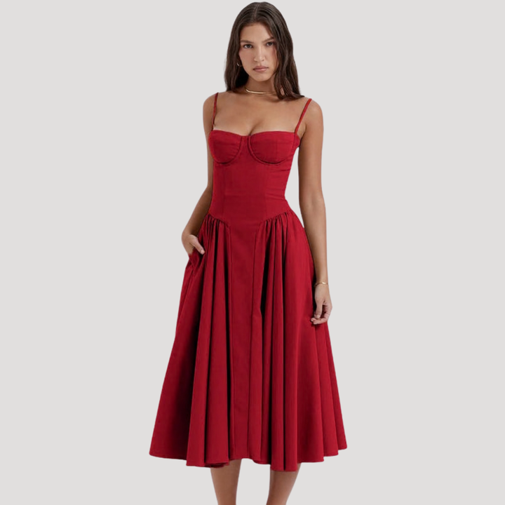 Feminine strappy midi dress with sweetheart neckline and flowy A-line skirt. Perfect party dress.