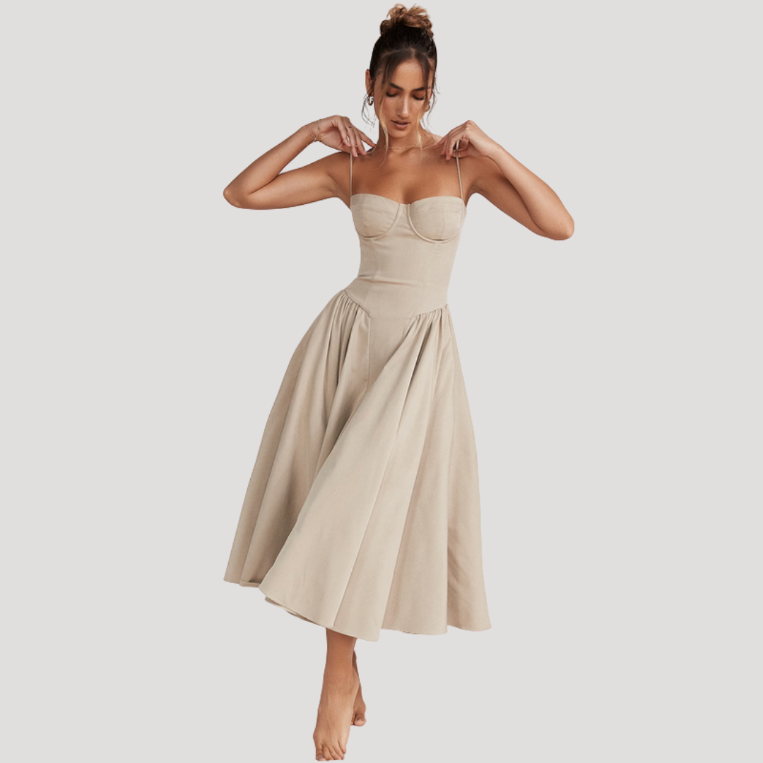 Chic cocktail midi dress with sweetheart neckline, structured corset, and graceful A-line skirt.