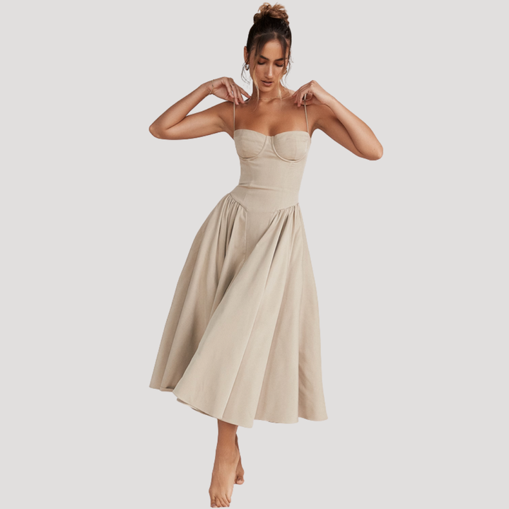Chic cocktail midi dress with sweetheart neckline, structured corset, and graceful A-line skirt.