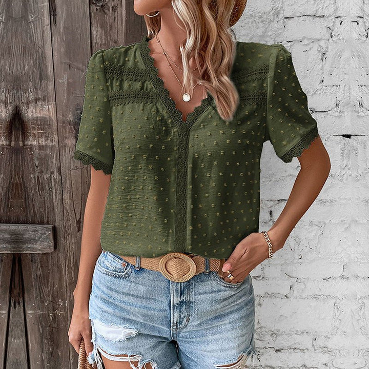 Comfortable women's Swiss Dot V-neck blouse with lace trim. Relaxed fit for spring and summer fashion.