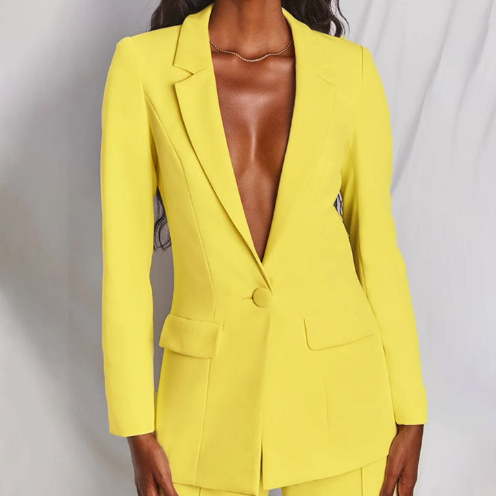Elegant women's matching blazer and trousers set, perfect for formal wear or office.