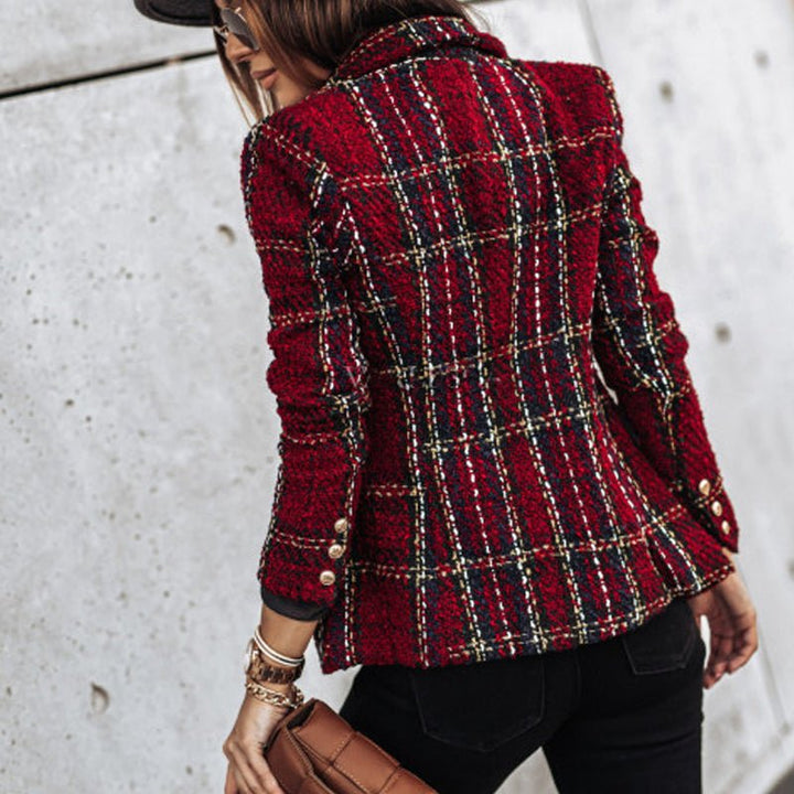 Women's check tailored blazer, double-breasted with prominent gold buttons, a sophisticated fashion statement.