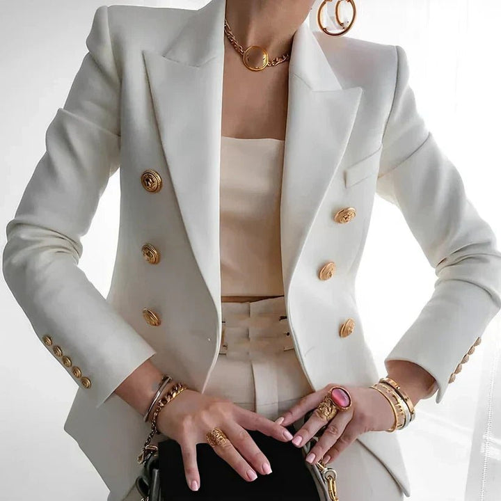 Chic women's tailored blazer, double-breasted design with elegant gold buttons, ideal for power dressing.