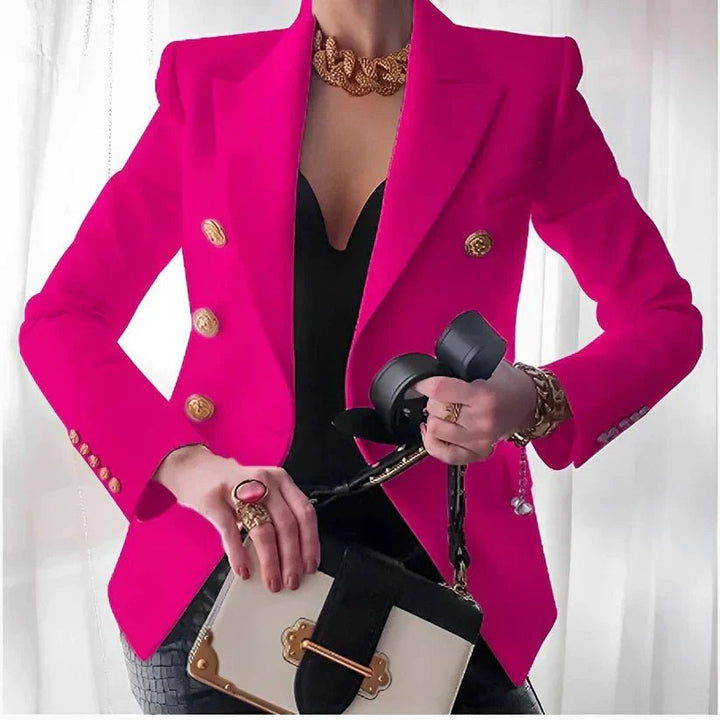 Tailored women's blazer, double-breasted with luxurious gold buttons. Professional, chic office attire.
