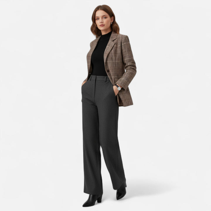 Stylish women's plaid blazer, perfectly tailored for professional office attire & elegant evening events.