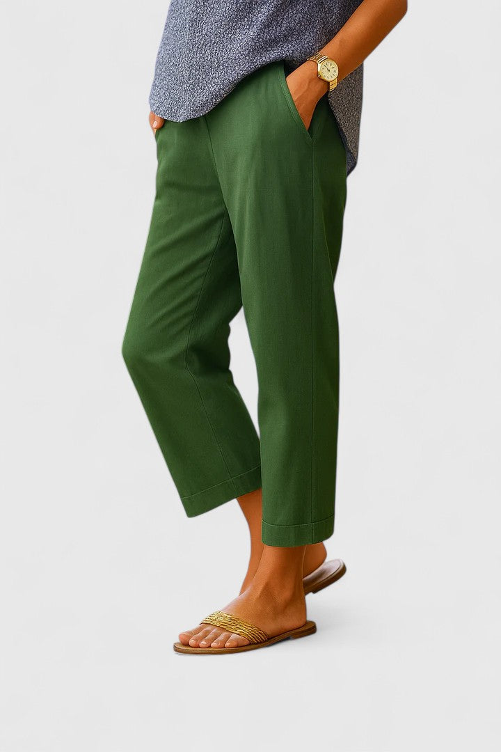 Stylish women's straight leg pants with a tailored fit, cuff hem, & functional pockets. Smart casual trousers.