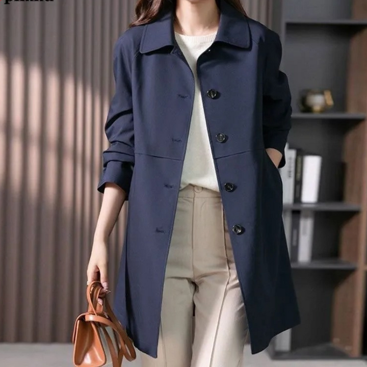 Lightweight women's trench coat, ideal for spring & fall outerwear. Effortless style & all-day comfort for any occasion.