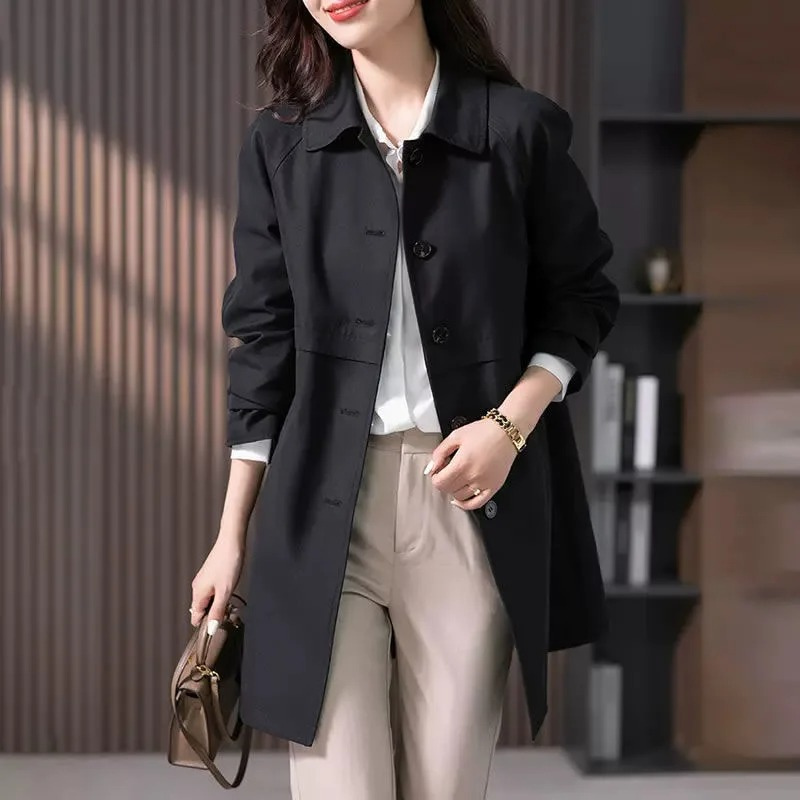 Versatile women's single button trench coat. Tailored fit for both casual jackets and sophisticated office attire.