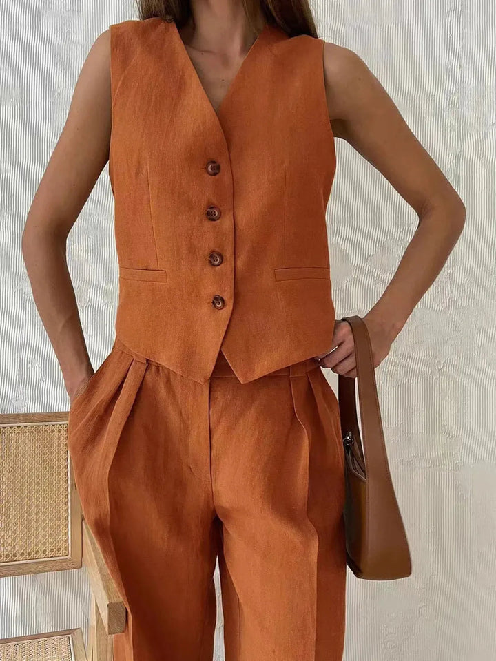 Women's tailored two-piece set with a chic waistcoat and flowy wide leg trousers. An elegant fashion set for any occasion.