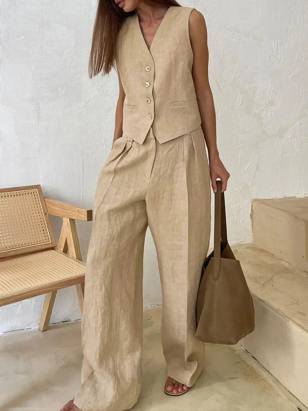 Professional women's tailored waistcoat & wide leg trouser set. A smart office wear two-piece for a chic and elegant look.