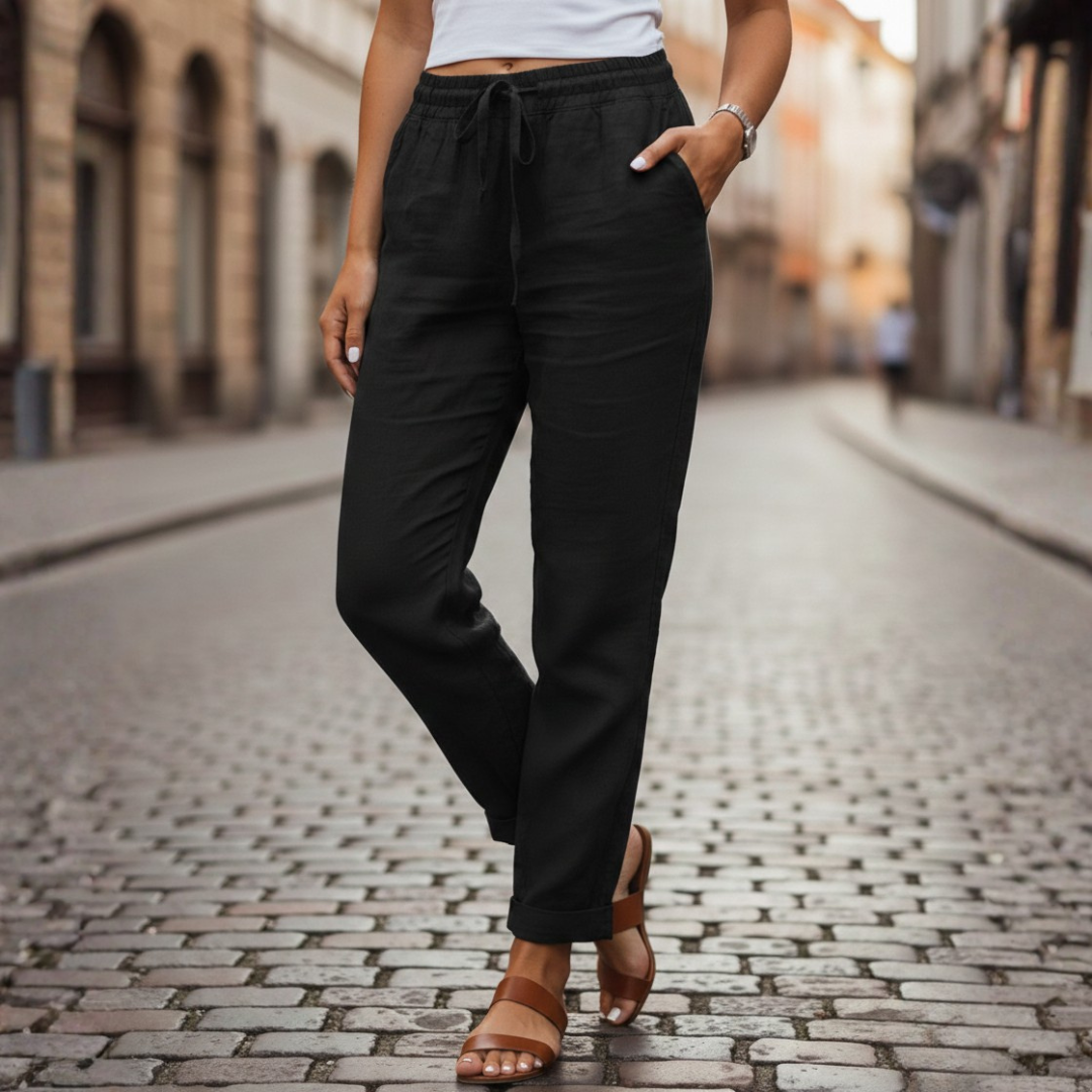 Relaxed fit women's tapered drawstring pants for spring & summer fashion. Casual & comfortable daily wear.