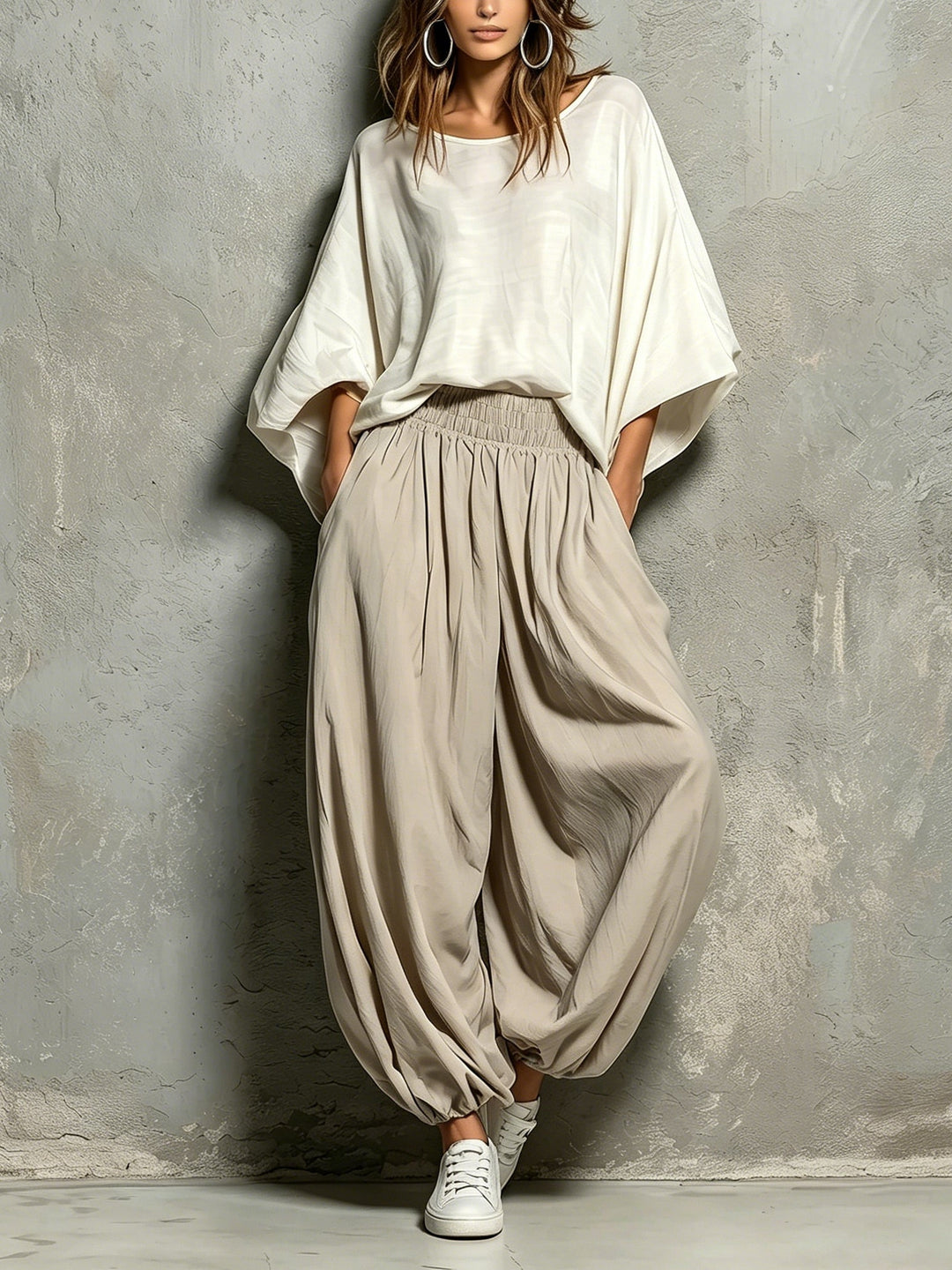 Women's taupe high waist wide leg harem pants with drawstring. Comfortable, casual, and boho style for spring/summer.