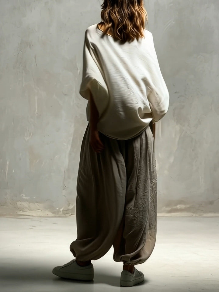 Stylish women's taupe wide leg harem pants, high waist with drawstring. Perfect for loungewear, travel, or casual wear.