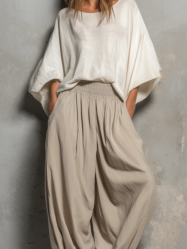 Comfortable taupe high waist wide leg harem pants for women. Versatile boho style, ideal for spring, summer & travel.