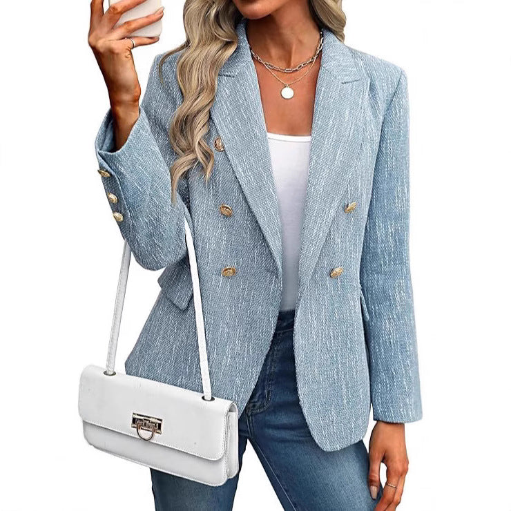 Women's textured double-breasted blazer with elegant gold buttons. Perfect for work or stylish outerwear.