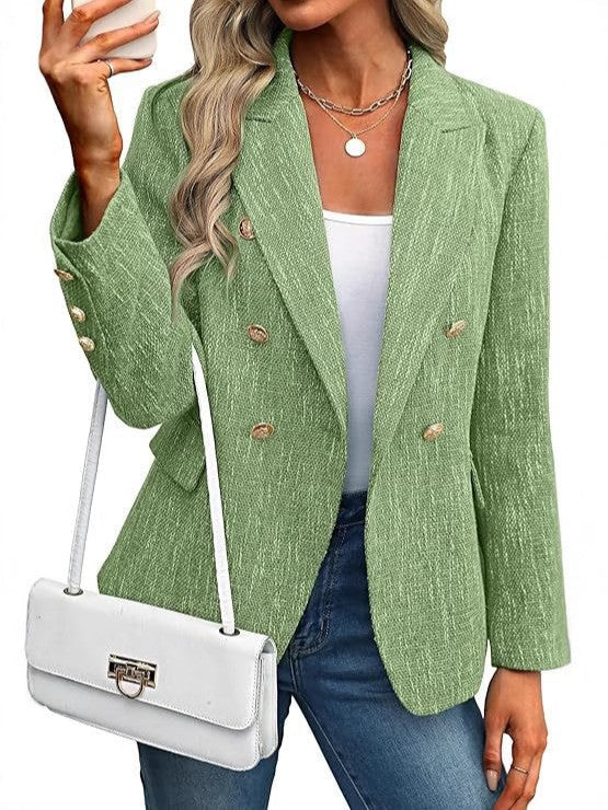 Fashionable women's jacket: textured double-breasted blazer featuring elegant gold button fastenings.