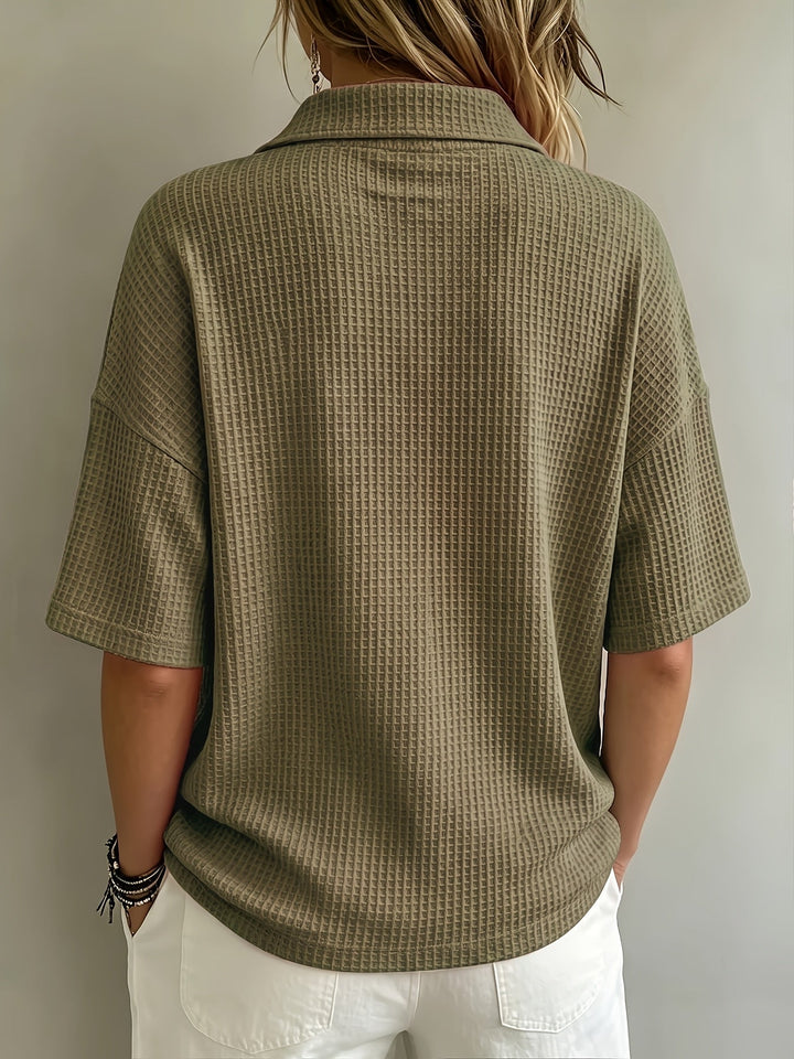 Comfortable women's collared polo top, versatile for spring, summer, and fall style.