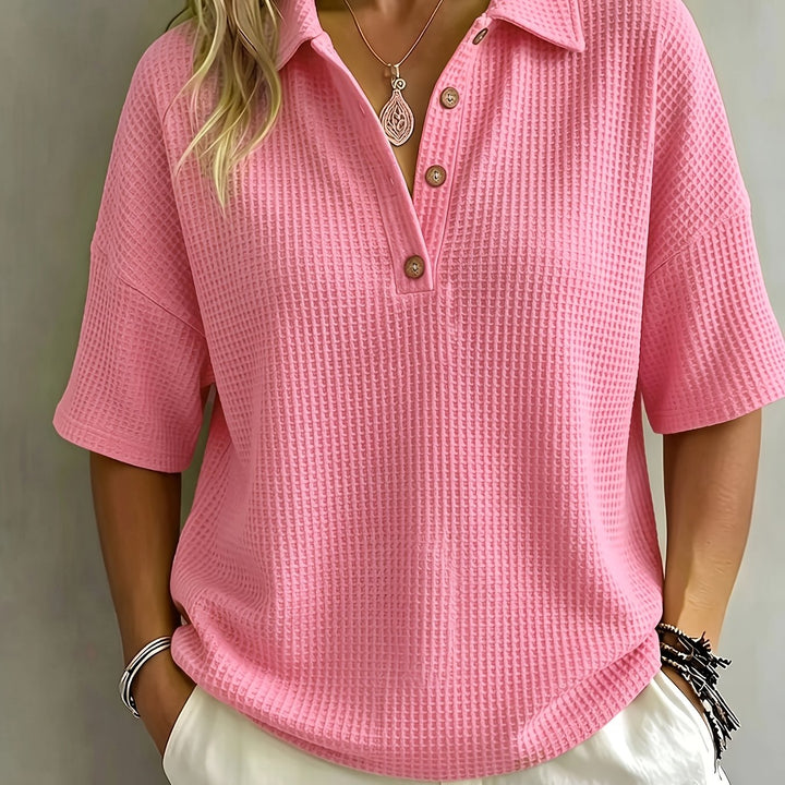 Oversized women's textured polo top, stylish and comfortable for everyday casual looks.