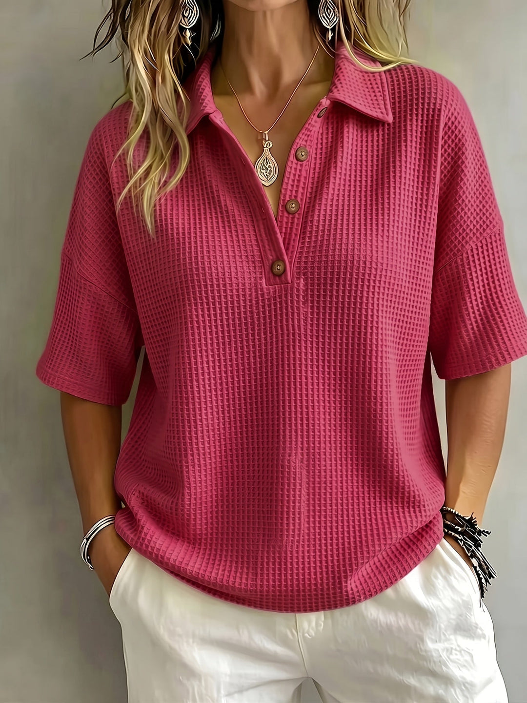 Comfortable women's polo shirt with textured fabric, ideal for summer & fall.