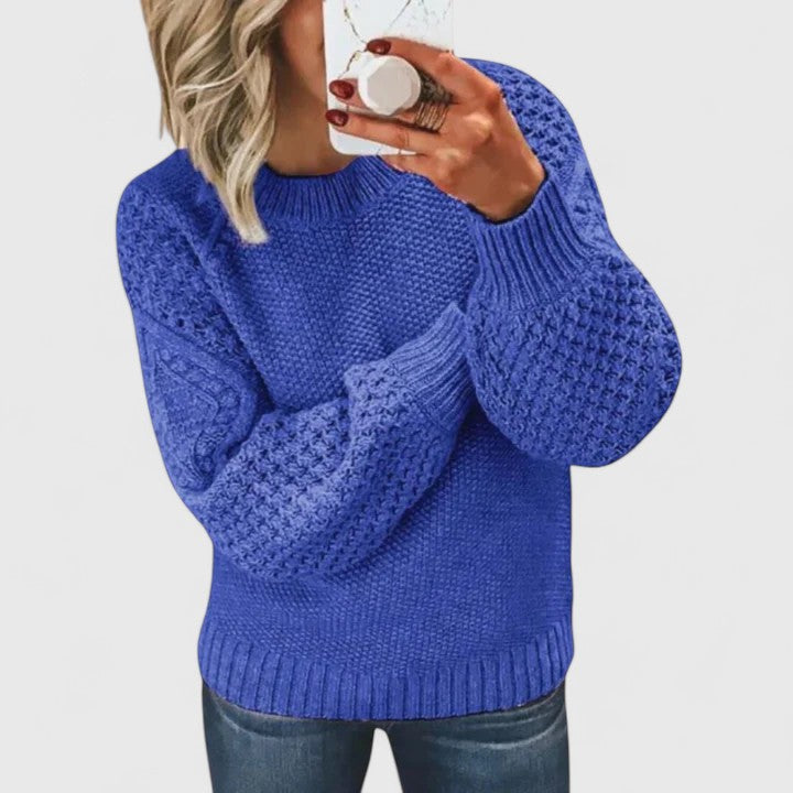 Women's textured puff sleeve sweater with a mock neck. Cozy & stylish pullover for autumn and winter fashion.