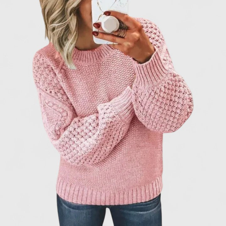 Elegant women's textured sweater featuring romantic puff sleeves & mock neck. Versatile top for casual chic style.