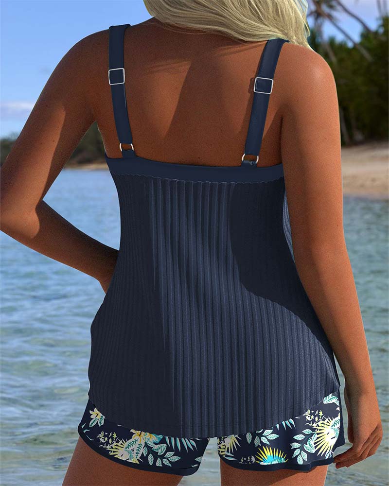 Stylish women's tropical print tankini set featuring a tie-front sweetheart top & comfortable boyshorts.