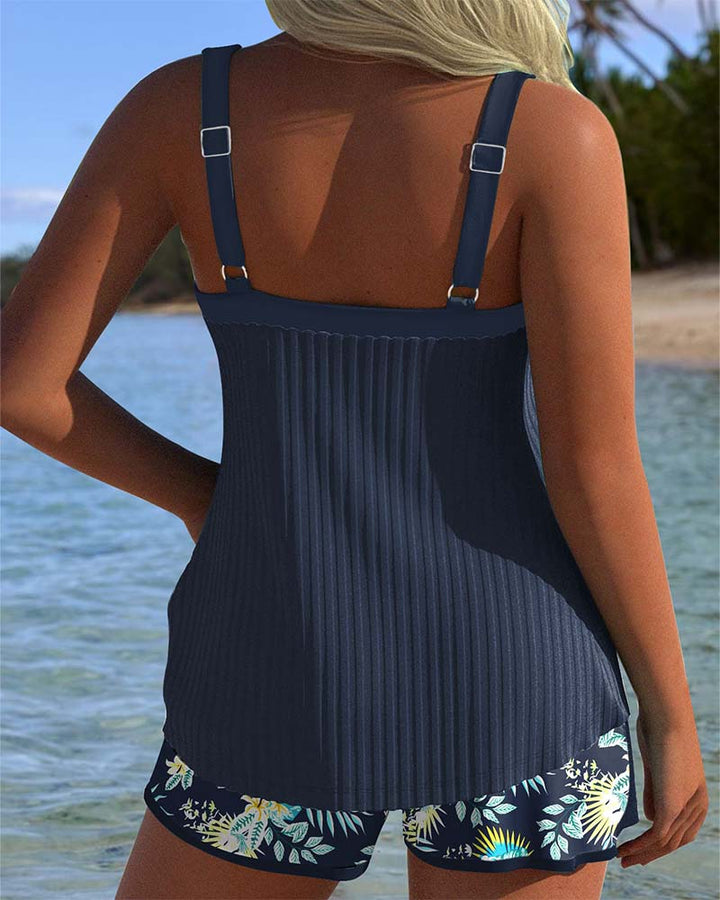 Stylish women's tropical print tankini set featuring a tie-front sweetheart top & comfortable boyshorts.