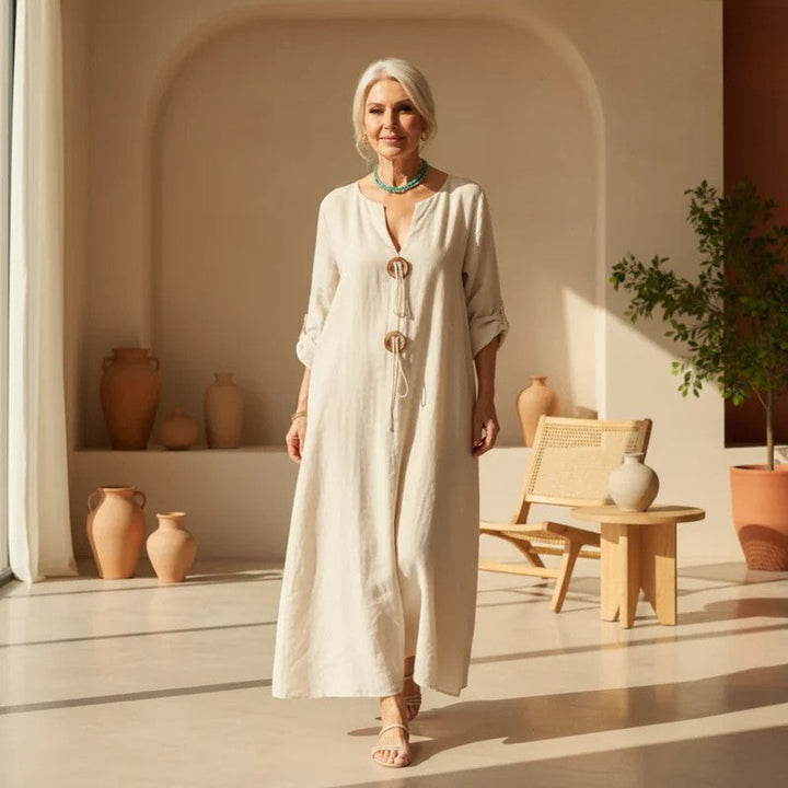 Women's timeless tunic dress, elegant & comfortable. Features versatile adjustable sleeves, perfect for summer style.