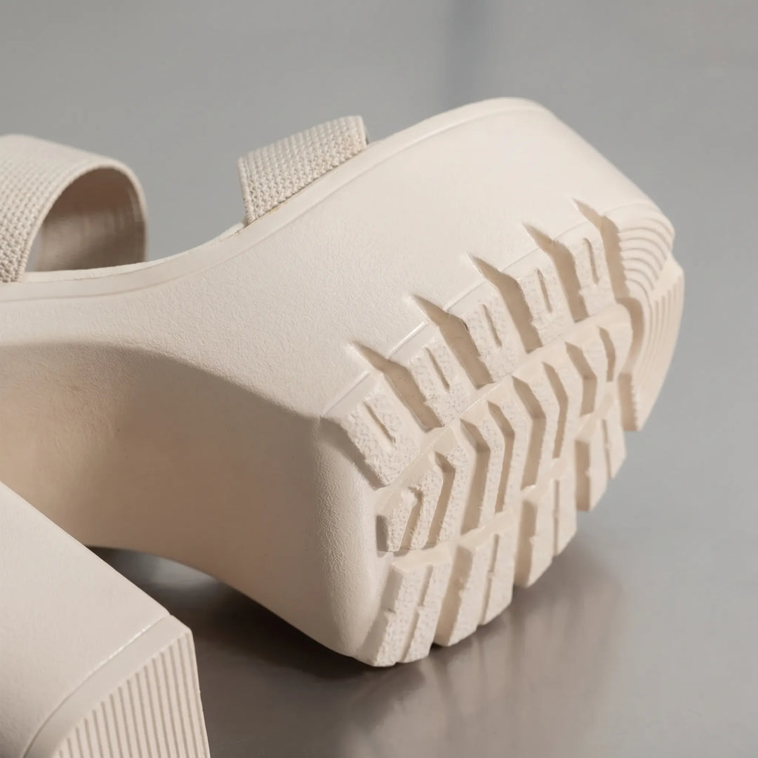 Open-toe women's chunky platform sandals with a stylish block heel, ideal for trendy summer footwear.