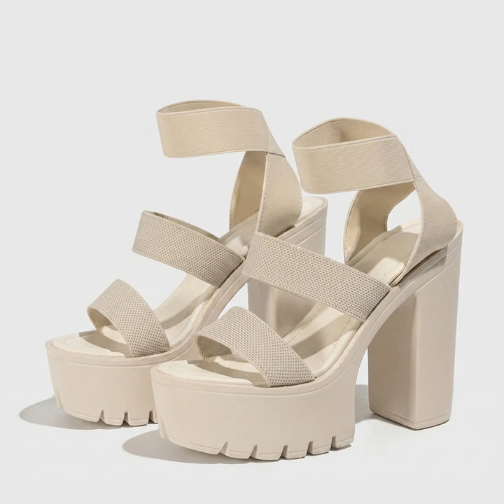 Trendy women's high platform sandals with a chunky block heel and open toe, great for fashionable summer wear.