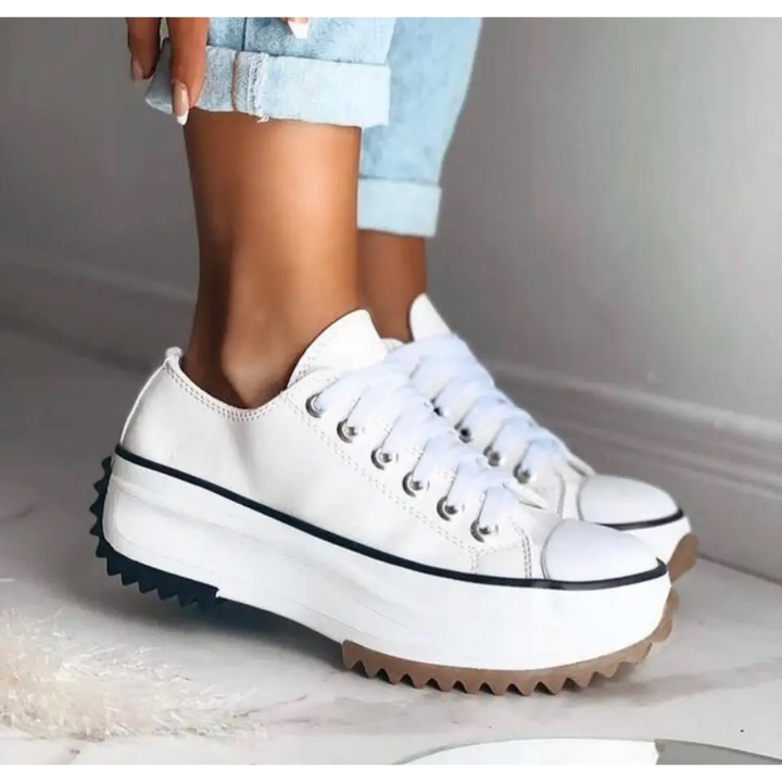 Pair of fashionable women's platform sneakers, designed for ultimate comfort and contemporary style.