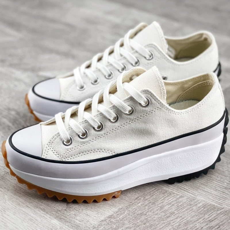 Women's stylish platform lace-up sneakers, versatile for various casual outfits, offering a trendy edge.