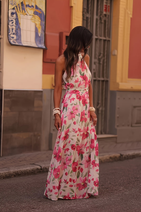 Women's tropical floral maxi dress with halter neck and keyhole, ideal for beach and vacation.