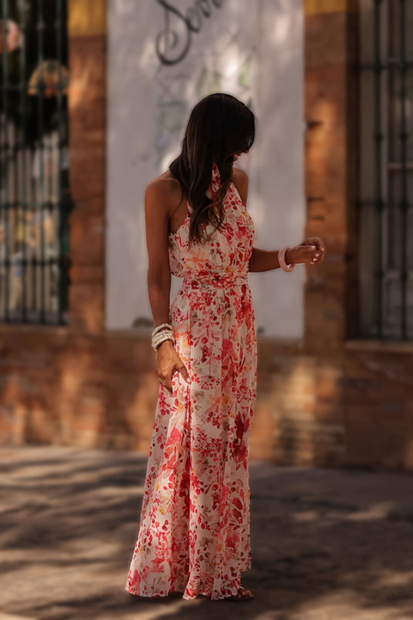 Stylish tropical resort wear maxi dress for women, halter neck keyhole design, perfect for summer.