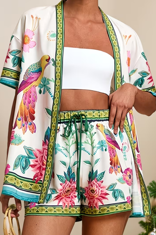 Women's tropical print two-piece summer set with floral shorts and matching top, perfect for vacation.