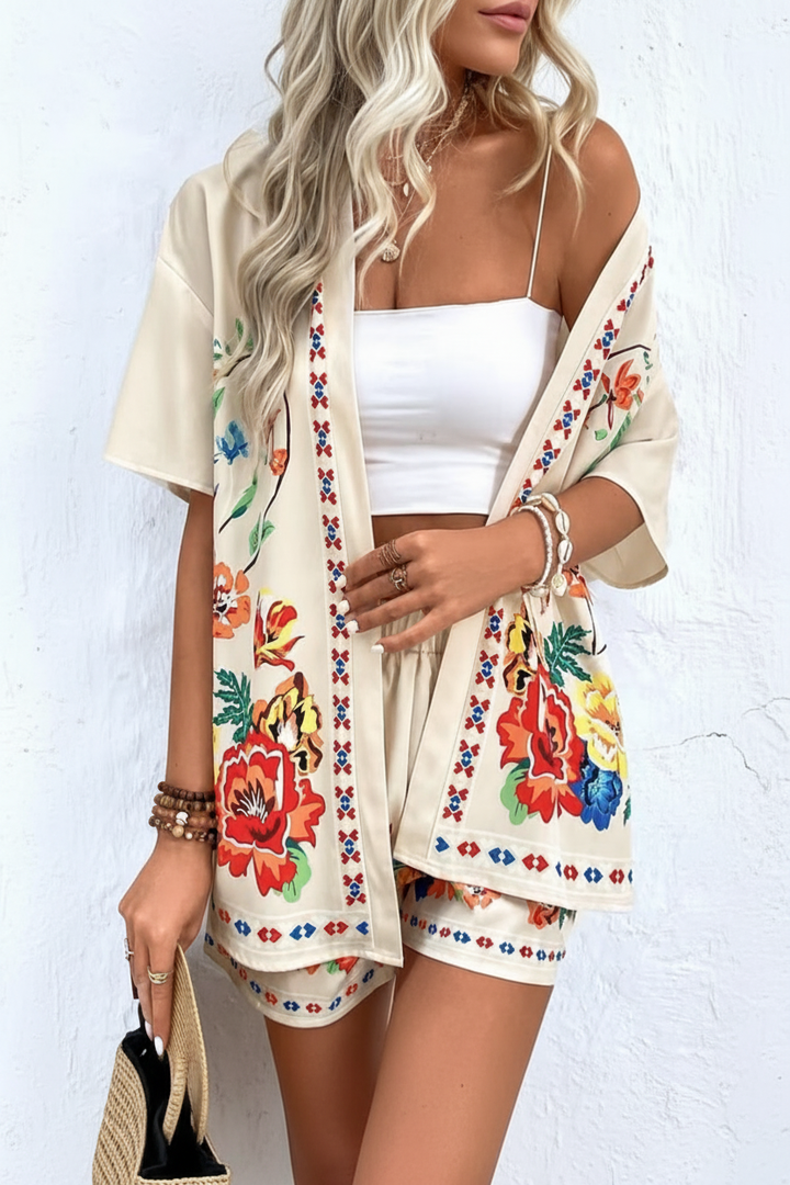 Women's summer two-piece tropical print shorts set with a beautiful floral pattern, great for resort.